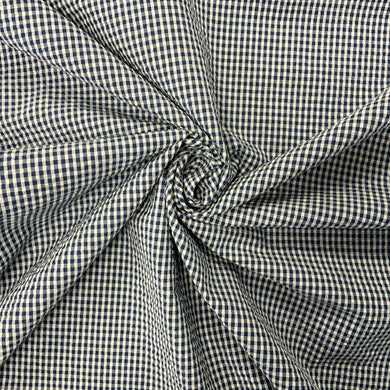Introducing this amazing Italian deadstock sewing fabric. A blue and white small checked fabric. Gingham fabric is instantly recognisable and a firm favourite for many especially during the spring and summer months, but also popular into Autumn. Known for its checked patterns of white and a bold colour. Seersucker is a summery cotton fabric which has a puckered surface due to the alternate tight and loose yarns in the weaving process.