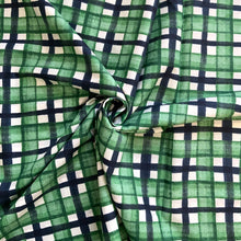 Load image into Gallery viewer, A beautiful checked cotton lawn sewing fabric, from the wonderful KOKKA Fabrics. It has a subtle wavy black lines crossing water colour like green lines against a white background. A soft, light weight fabric, with a bit of structure to it, making it easy to handle especially if you are early into your sewing journey. 
