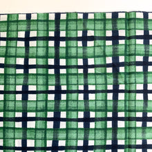 Load image into Gallery viewer, A beautiful checked cotton lawn sewing fabric, from the wonderful KOKKA Fabrics. It has a subtle wavy black lines crossing water colour like green lines against a white background. A soft, light weight fabric, with a bit of structure to it, making it easy to handle especially if you are early into your sewing journey. 
