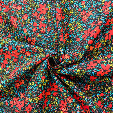 Introducing this beautiful vibrant red floral design, with bold red flowers along with mini blue and yellow flowers against a black background. Pima Cotton lawn is premium quality plain weave textile with a smooth finish, light in weight and also soft to the touch. A great fabric to work with, incredibly versatile and would suit dresses and blouses. 