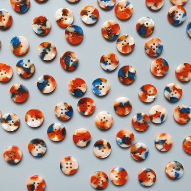 Introducing Pigeon Wishes Buttons. Beautiful bio resin buttons and the production of the resin buttons can be embedded in various colors and patterns without painting the buttons. Pigeon Wishes buttons is also known for it’s natural resin with hypoallergenicity.   The Pigeon Wishes Aberystwyth Buttons are beautiful and rich in colour and have such an elegant finish. With colours such as navy, orange, hints of red and cream.