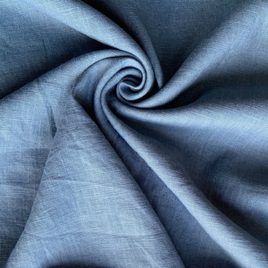 This is a wonderful denim blue washed linen fabric. Washed linen means fabric which has been washed already to reduce shrinkage and provide additional softness. The fabric quality is lovely, with a strong sturdy handle but still provides some drape across the body.