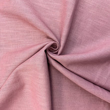 Load image into Gallery viewer, This is a wonderful mauve washed linen fabric. Washed linen means fabric which has been washed already to reduce shrinkage and provide additional softness. The fabric quality is lovely, with a strong sturdy handle but still provides some drape across the body. Linen is a great fabric to use because it feels light and is  breathable. It is an ideal dressmaking fabric for clothing such as dresses, skirts, trousers but also decorative purposes too.

