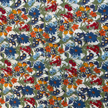 Load image into Gallery viewer, A wonderful Pima cotton lawn fabric, a high quality cotton lawn that features a beautiful array of flowers in a range of beautiful vivid colours such as orange, blue, red and yellow against a white background. Pima Cotton Lawn is a plain weave textile, with a crisp finish, it also has an added bonus of being extremely light weight, with a smooth silk like touch. You could make a multitude of items with this lovely fabric, and if dressmaking it would look amazing as a dress or top. 
