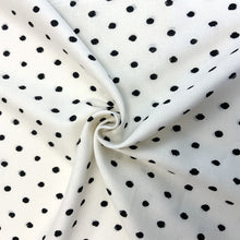 Load image into Gallery viewer, Featuring circles with a sketch effect against a white background. The cotton twill design is simple yet elegant and by mixing cotton and linen together you get a soft, drapey, absorbent, breathable and extremely comfortable fabric. With the combined mix of fabric yarns it is an ideal dressmaking fabric for clothing such as dresses, skirts, trousers but also decorative purposes too.
