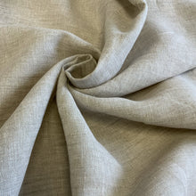 Load image into Gallery viewer, Introducing this amazing Italian deadstock sewing fabric. A lovely quality oatmeal coloured linen fabric. Linen is a great fabric to use because it feels light and is breathable. It is an ideal dressmaking material for clothing such as dresses, skirts, trousers but also decorative purposes too..
