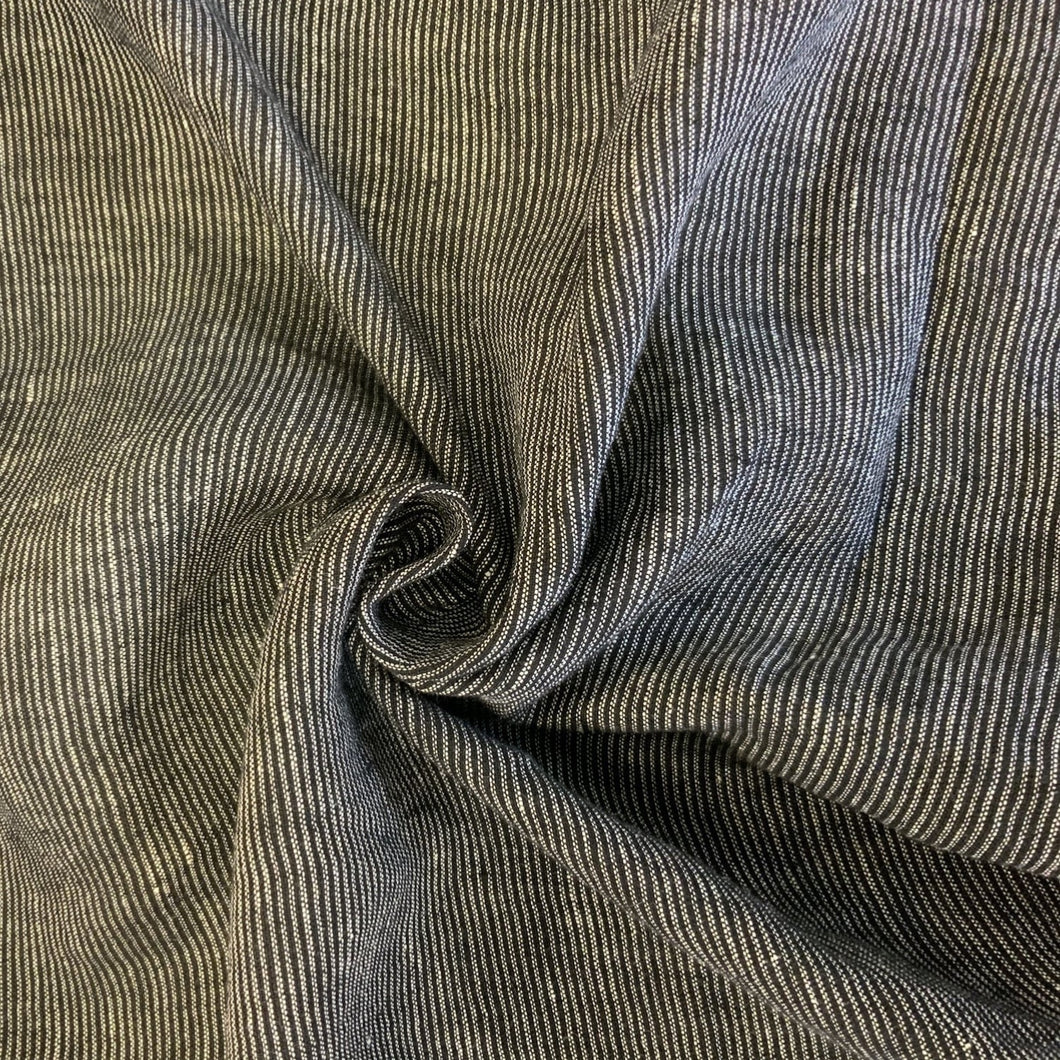 Introducing this amazing Italian deadstock sewing fabric. A lovely quality black and grey coloured linen fabric. Linen is a great fabric to use because it feels light and is breathable. It is an ideal dressmaking material for clothing such as dresses, skirts, trousers but also decorative purposes too.