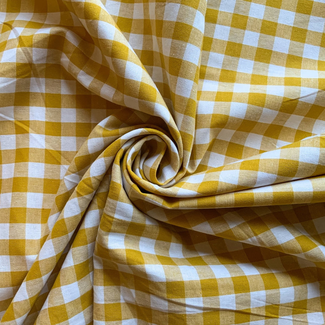 Gingham fabric is instantly recognisable and a firm favourite for many especially during the spring and summer months, but also popular into Autumn. Known for its checked patterns of white and a bold colour.
