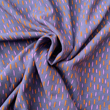 Load image into Gallery viewer, We have this light weight viscose fabric with light purple and orange dashes against a dark purple background. Viscose fabric is a semi-synthetic type of Rayon, made from wood pulp it gives a smooth silk like finish and as a light weight fabric will drape well across the body. It makes it a versatile sewing fabric as it can be used for a number of sewing projects, including dresses, skirts, blouses and light weight trousers to name a few.  
